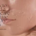 A close-up of a person's face showing peeling skin; text overlay reads "How to Build a Skincare Routine for Dry Skin for youthful and healthy skin".
